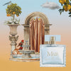 MAIR perfume in front of a fountain and lemon tree
